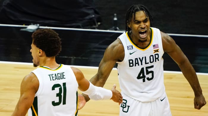 Baylor Bears guard Davion Mitchell (45) celebrates with guard MaCio Teague (31)